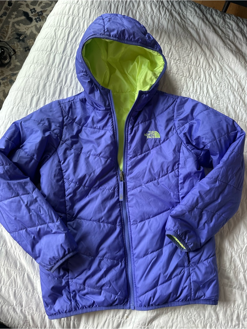 The North Face girls reversible hooded puffer jacket, purple and neon green, L